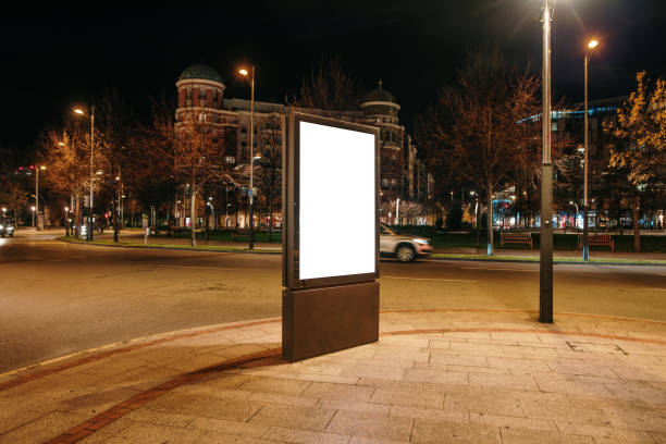 istock Blank billboard in a city street at night 2150001403