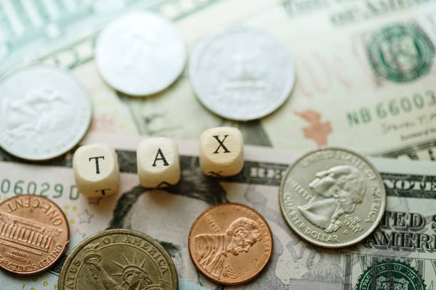 istock Tax and dollars 2150001431