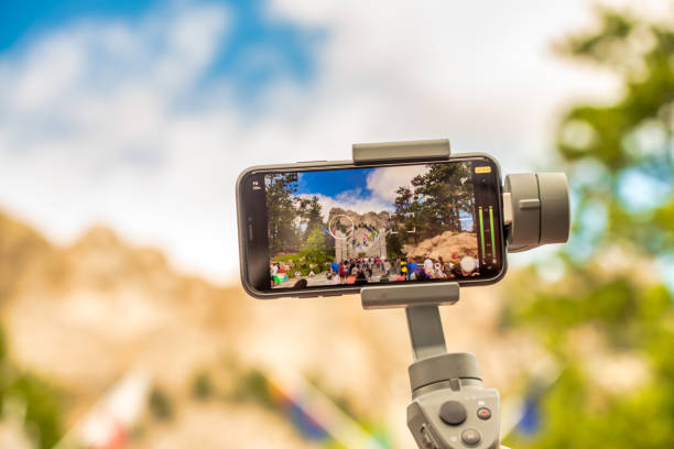istock Mount Rushmore National Monument through a smartphone screen. Summer season colours 2150001715