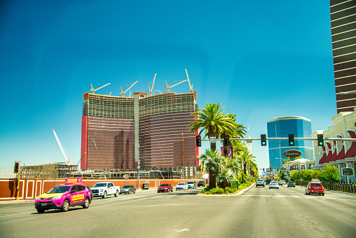 Las Vegas, NV - June 28, 2019: Road traffic along the famous Strip on a sunny summer day.