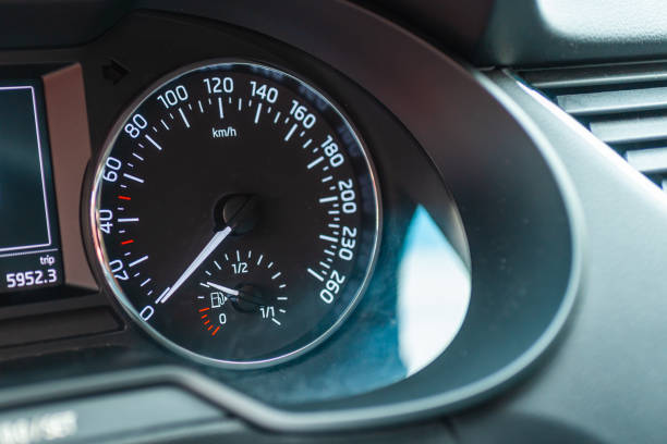 istock Modern car speedometer,odometer,tachometer and illuminated dashboard. car dashboard modern automobile controlilluminated panel speed display.Car instrument panel.Close up.Selective focus. 2150002261
