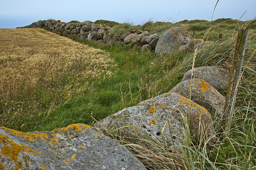 Stone wall at the beach Refsnesstranda at the scenic route Jaeren in Norway, Europe
