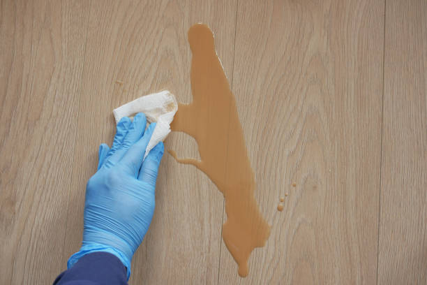 istock A man's hand washing the floor with a cloth 2150005579