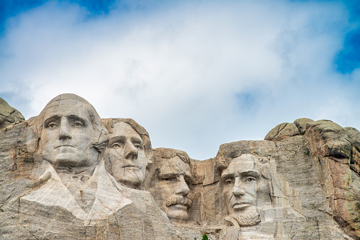 The busts of Presidents George Washington, Thomas Jefferson, Teddy Theodore Roosevelt, and Abraham Lincoln carved Borglum into the Black Hills of South Dakota at Mount Rushmore