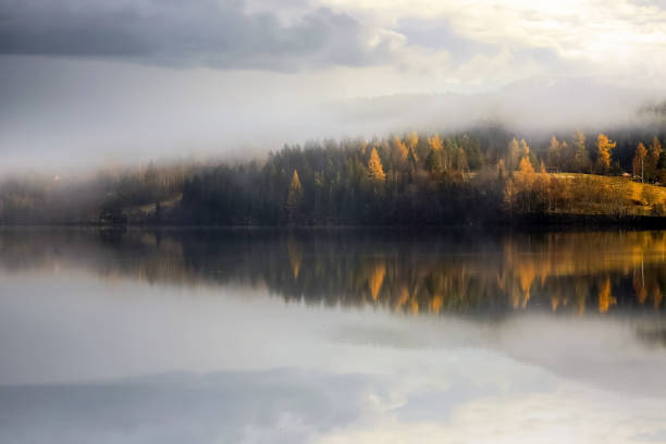 istock Fog at the lake Jonsvatnet, Norway 2150006000