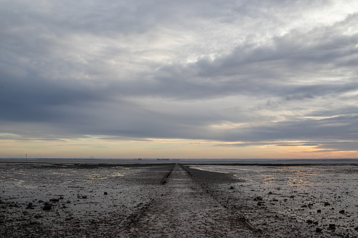 Pathway to the Thames at Westcliff, Essex, England, United Kingdom at sunset