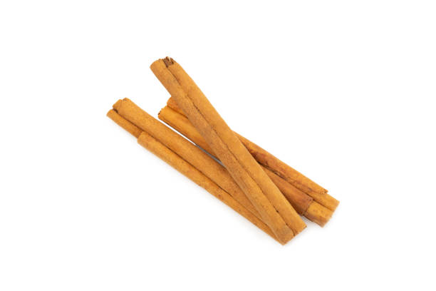 istock Ceylon cinnamon.Cinnamon sticks on background. Cinnamon roll and powder. Spicy spice for baking, desserts and drinks. Fragrant ground cinnamon. Close-up. Place for text. copy space 2150007072