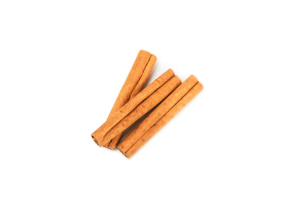 istock Cinnamon sticks isolated on white background. Cinnamon roll. Spicy spice for baking, desserts and drinks. Fragrant ground cinnamon. 2150007783