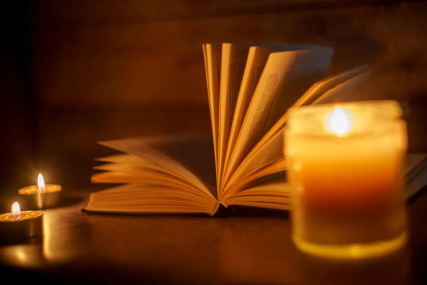 istock The Book in the candlelight 2150011002