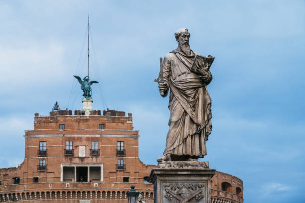 Rome, Italy - December 02, 2017: An antique sculpture on the Ponte Sant’ Angelo pedestrian bridge.