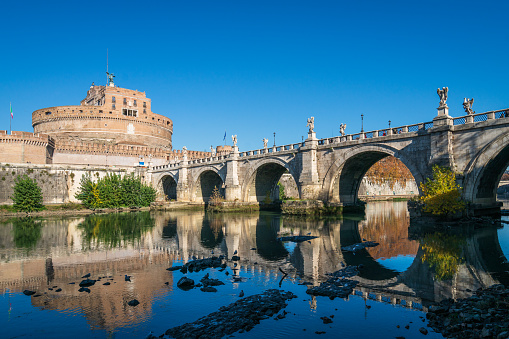 Rome, Italy - December 02, 2017: Embankment near St. Angelo bridge over river Tiber in autumn