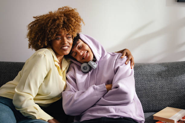 istock Warm Embrace: African American Mother and Son Bonding at Home 2150019607