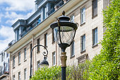 Old street lamp against the background of a historical building in St. Petersburg, Russia