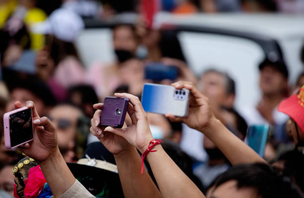 istock Cell phones aloft 2150020818