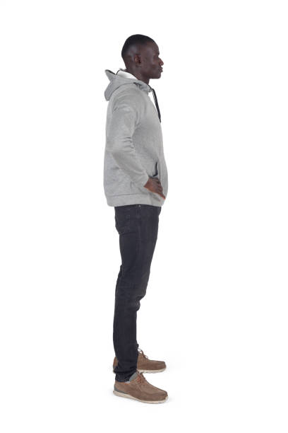 man isolated on white background side view portrait of a man standing with arms akimbo on white background man standing profile stock pictures, royalty-free photos & images