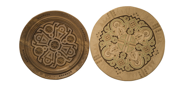 two traditional Ukrainian decorative wooden plates, rune work