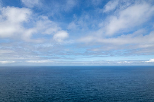 Sky with cumulus clouds and the Atlantic Ocean - only water and sky