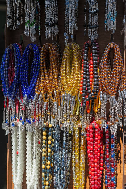 istock Various rosaries on the street vendor's stall. 2150029395