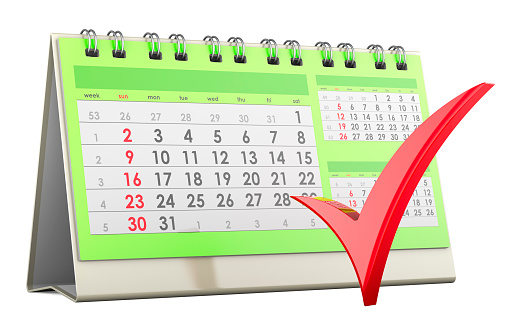 Desk Calendar with red check mark, 3D rendering isolated on white background
