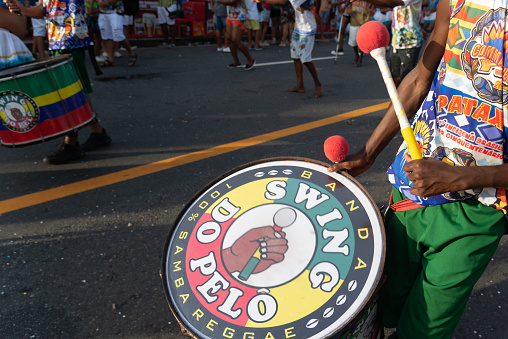 Salvador, Bahia, Brazil - February 03, 2024: Musicians are seen playing percussion instruments during Fuzue, pre carnival in the city of Salvador, Bahia.