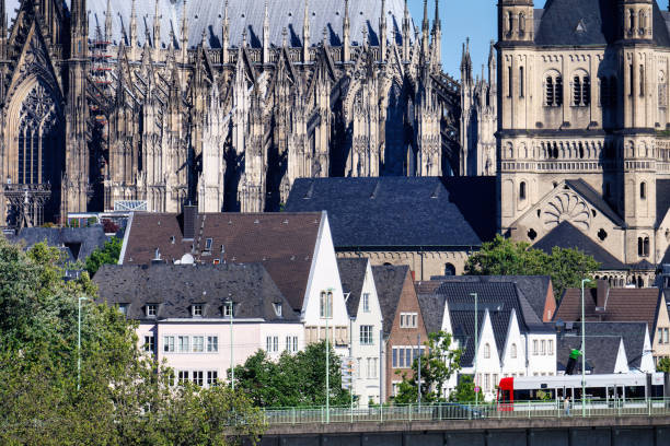rhine bridge and old town in the shadow of the monumental churches in the old town of cologne