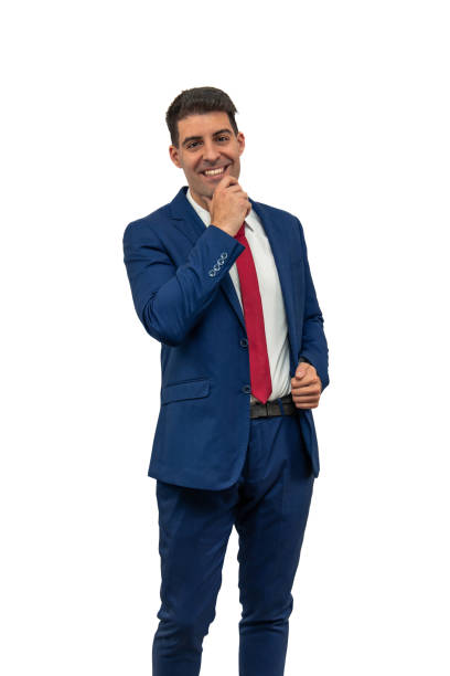 vertical Seductively Posed Businessman in Blue Suit and Red Tie white background