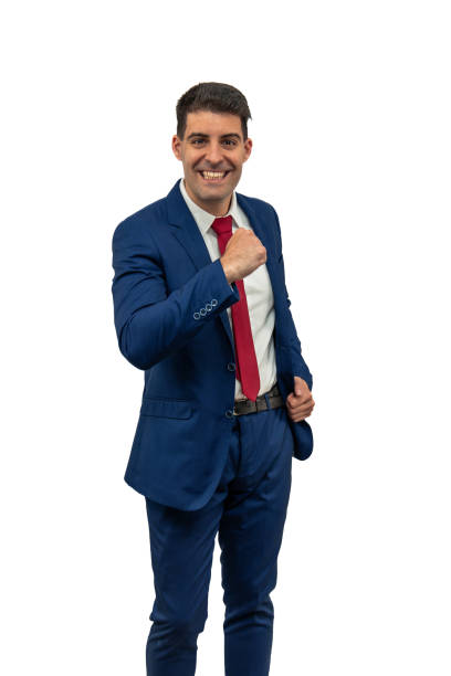 istock vertical Triumphant Businessman Clenching Fist with Victory Expression white background 2150041637
