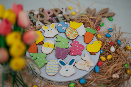 Image of colorful Easter cookies on a straw.