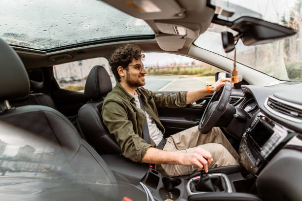 istock Young businessman driving a car 2150046131