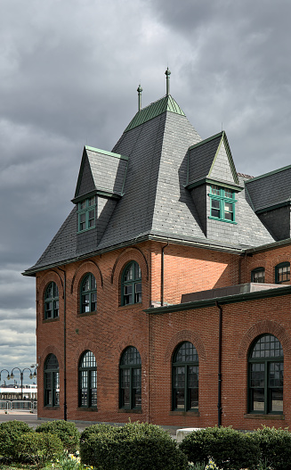 Central Railroad of New Jersey Terminal building detail in liberty state park (Communipaw Richardsonian Romanesque style building) disused train railroad station on the hudson river terminus terminal