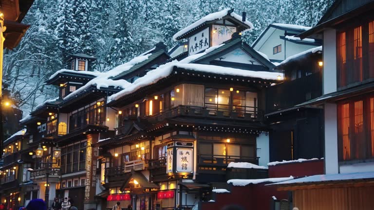 Historic Old Hot Spring Town with Snow on Roofs of Ginzan Onsen, Japan