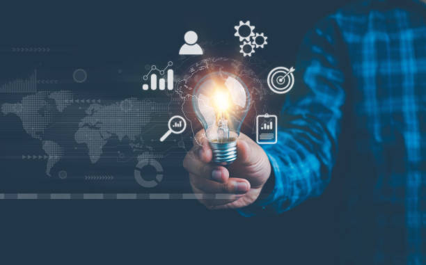 istock businessman holding light blub with virtual Global Internet connection. global internet connection application technology and digital marketing, Financial and banking, Digital link tech, big data. 2150050041