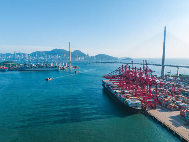 istock Container ship in import export and business logistic in Hong Kong 2150052165