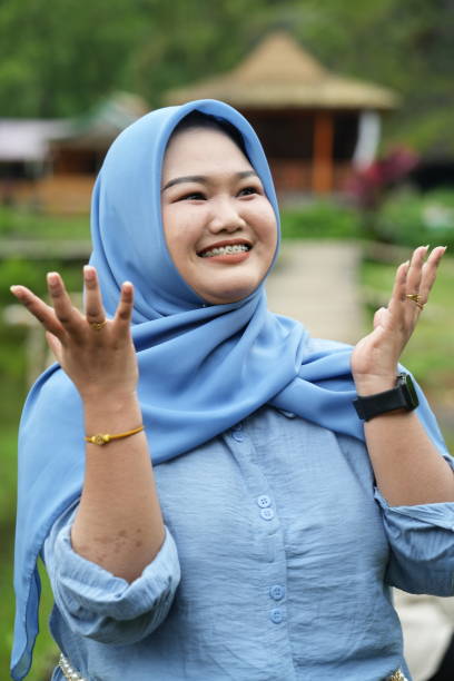 istock Asian model in hijab wearing blue shirt 2150054266