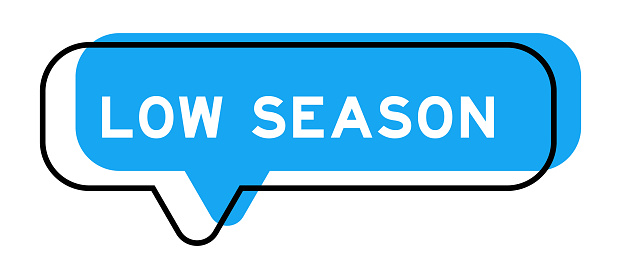 Speech banner and blue shade with word low season on white background