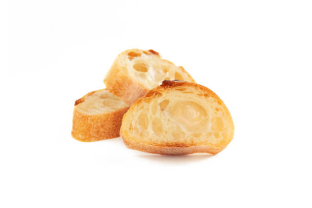 istock Three Slices of Baguette in White Background 2150062602
