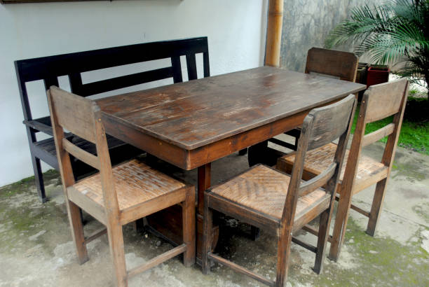 Simple Javanese furniture from teak wood and rattan woven.