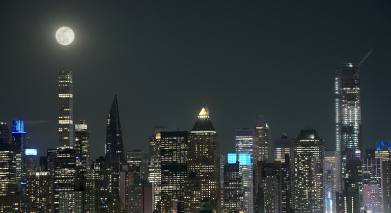 Midtown Manhattan Skyline with Full Moon Overhead