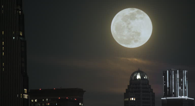 Full Moon in Sky Over New York City Buildings