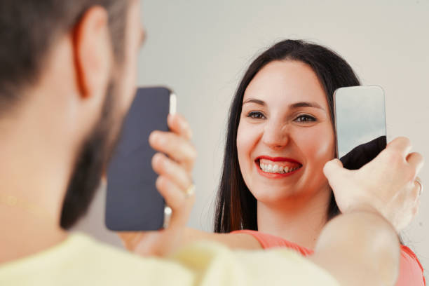 istock Sharing phone screens replaces need for words 2150068268