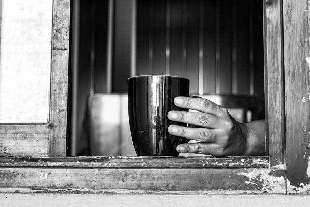Hands Holding Coffee Mug in a Black and White Portrait