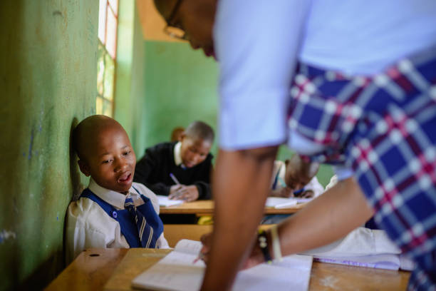 istock Female school teacher classroom one to one learner student support 2150078229