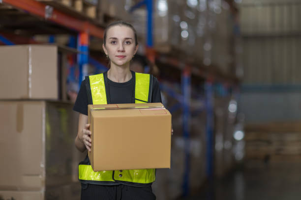 istock Warehouse worker working in warehouse storage. Foreman or worker work at factory site check up products in site. Inventory worker working in  factory Storehouse 2150080020