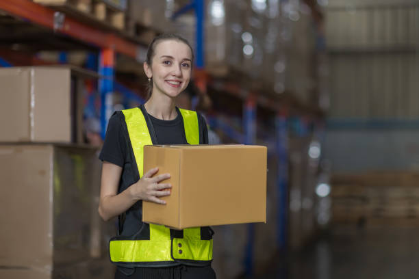istock Warehouse worker working in warehouse storage. Foreman or worker work at factory site check up products in site. Inventory worker working in  factory Storehouse 2150080030