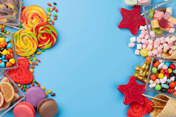 istock Various colorful candies, lollipops, and macaroons 2150080567