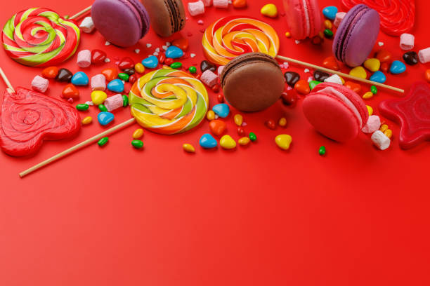 istock Various colorful candies, lollipops, and macaroons 2150080571