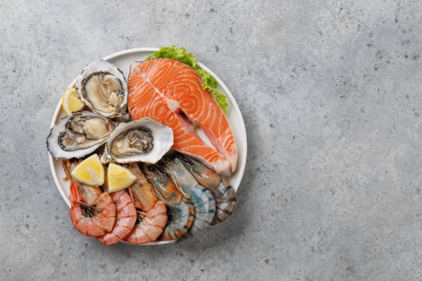 istock Seafood Platter Delight: Shrimps, Salmon, Oysters Galore 2150080806