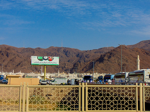 A view of the parking area that is filled by the tourist buses and cars in Uhud Mount.