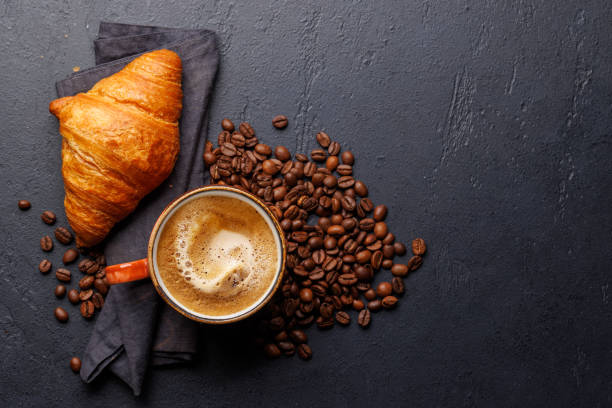 istock Cappuccino coffee and fresh croissant 2150081987