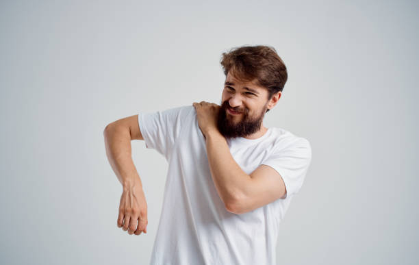 istock man has shoulder pain and white t-shirt dislocation health problems 2150082361